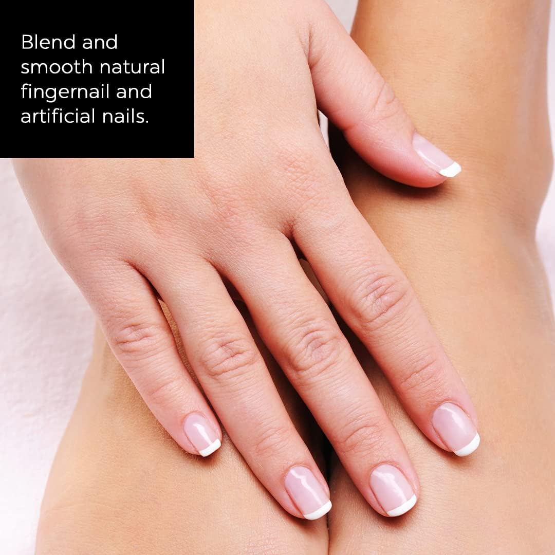 Close-up of hands with neatly manicured nails resting on legs, highlighting smooth natural and artificial nail finish with text overlay 'Blend and smooth natural fingernail and artificial nails