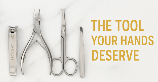 La Cross stainless-steel grooming tools arranged on marble background — sleek, hygienic, and durable beauty essentials with professional precision.