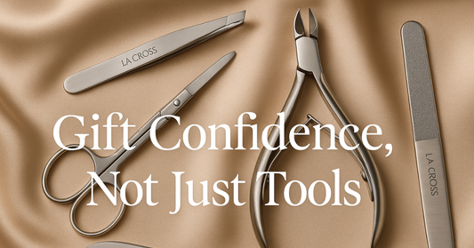 Stainless steel grooming tools on satin fabric with the text “Gift Confidence, Not Just Tools.