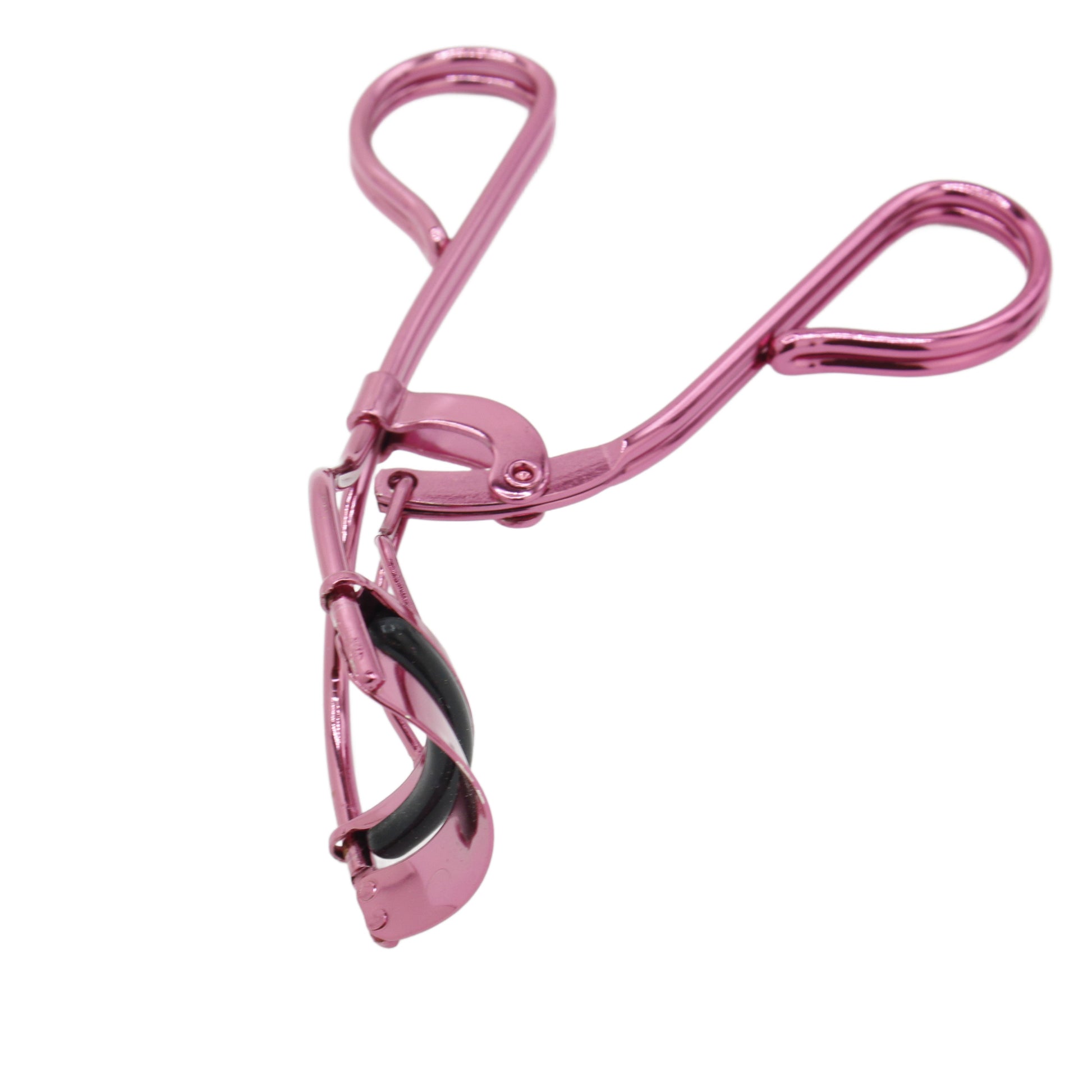 Side profile of pink La Cross eyelash curler highlighting its contoured frame and stainless steel lash pad.