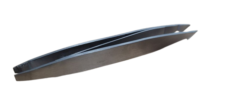 La Cross Dual Ended Tweezers photographed from an elevated angle showing brushed metal finish and dual-tip construction