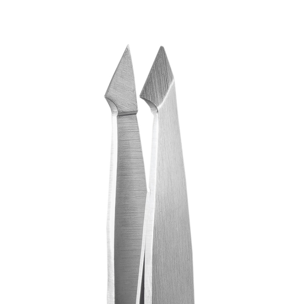 Tilted perspective of La Cross dual-ended tweezers, emphasizing ergonomic shape and both grooming ends