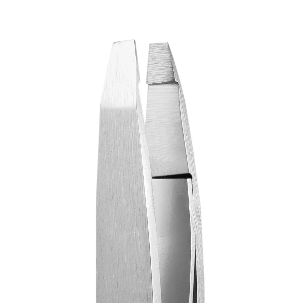 Close-up view of the tweezers’ tips, clearly showing slanted and straight tips in sharp detail