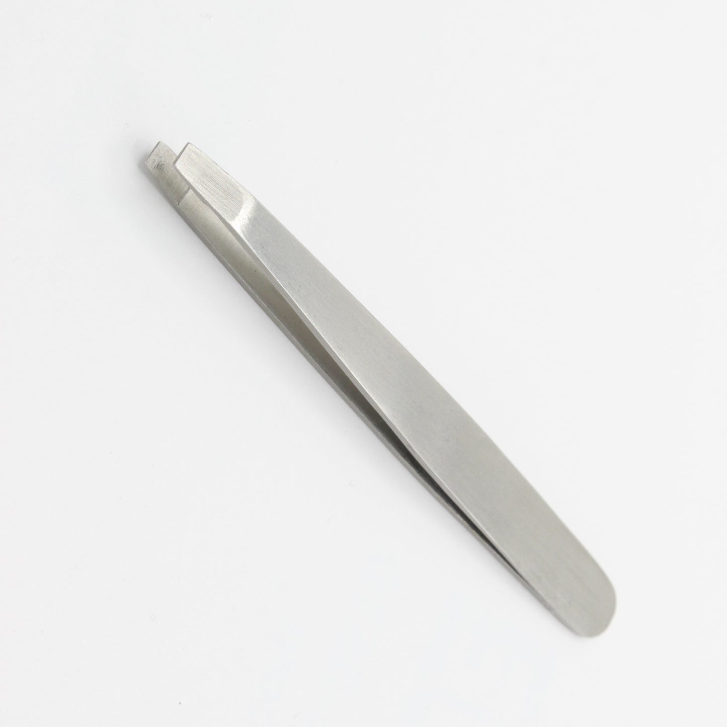 Silver straight tweezer for brow grooming and stray hair removal
