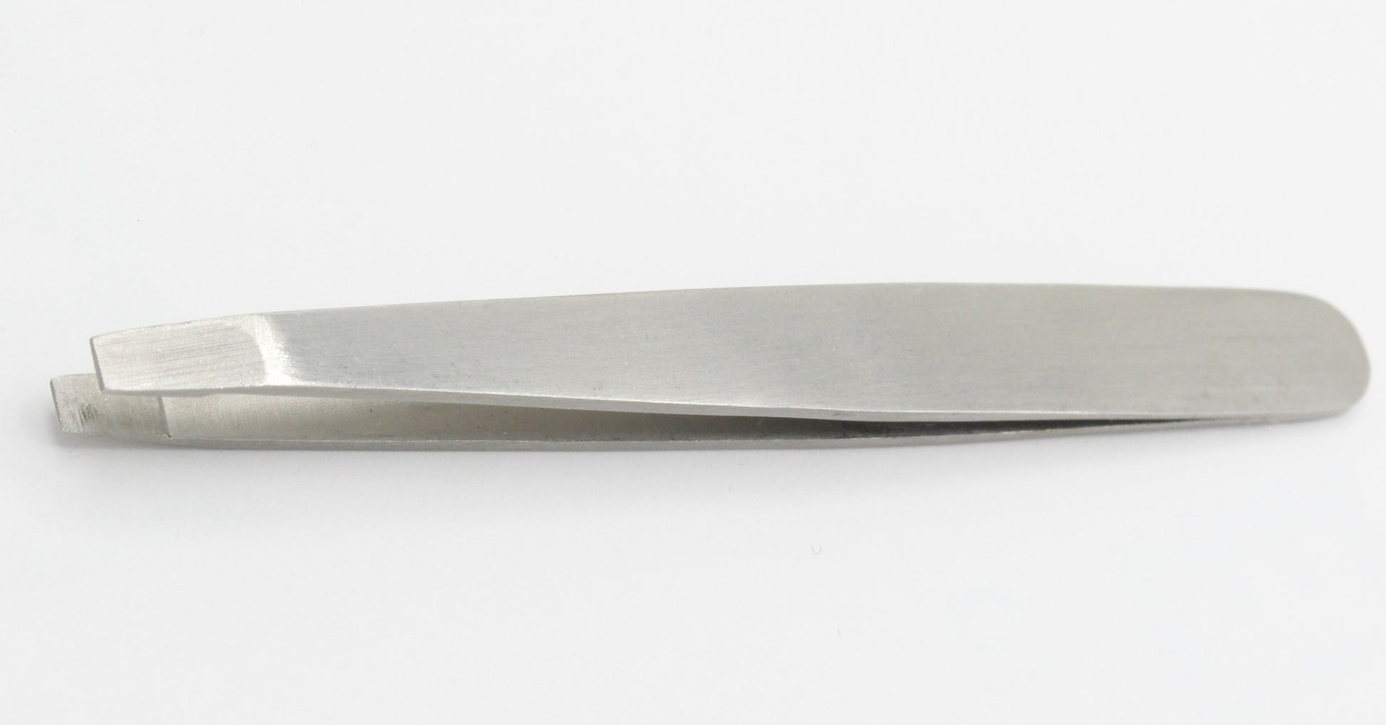 Close-up of La Cross straight tip tweezer showing firm grip design